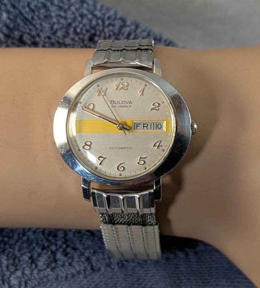 Rare Vintage 38mm 1973 Bulova President Automatic Swiss Wristwatch - Oval UFO Case 11 AOACB Movement with Rare Original Band. Original Case