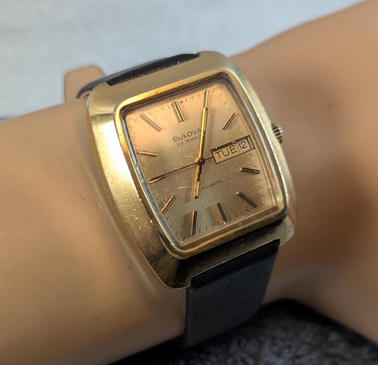 Fantastic & Rare Vintage 1974 Bulova Minute Man Automatic Wristwatch - Gold Tone Case Swiss 23 Jewel Auto Movement with new Leather Band.