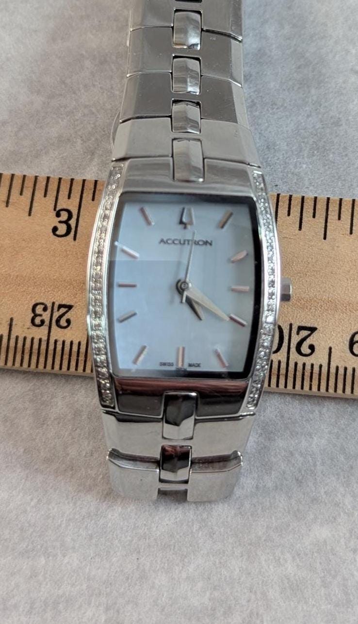 Wonderful Accutron by Bulova Ladies Watch -Beautiful Mother of Pearl Dial and Fine Crystal Accents on Bezel Dial - Working with New Battery