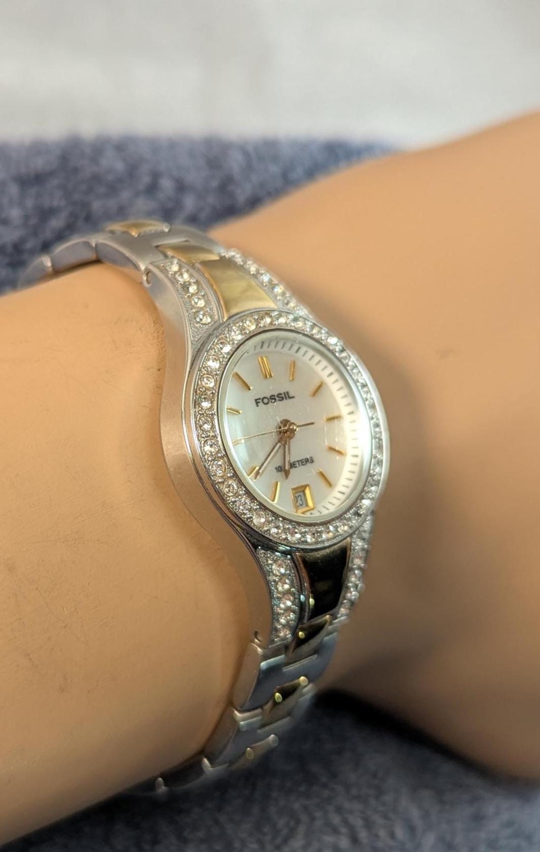 Fashionable and Stylish FOSSIL Ladies Watch - Silver and Gold Tone with MOP Dial and Crystal Bezel. Quartz Analog New Battery - Working
