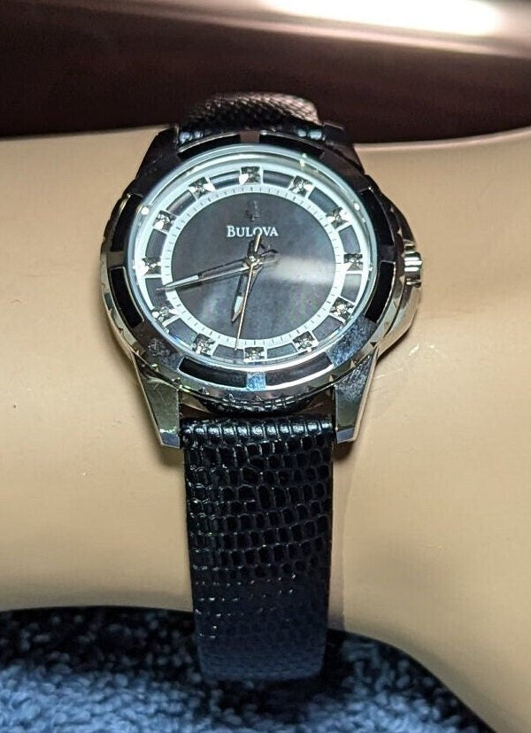 Nice Bulova Ladies Watch, Mother of Pearl Dial, Diamond Hour Marks, Enamel Inlay