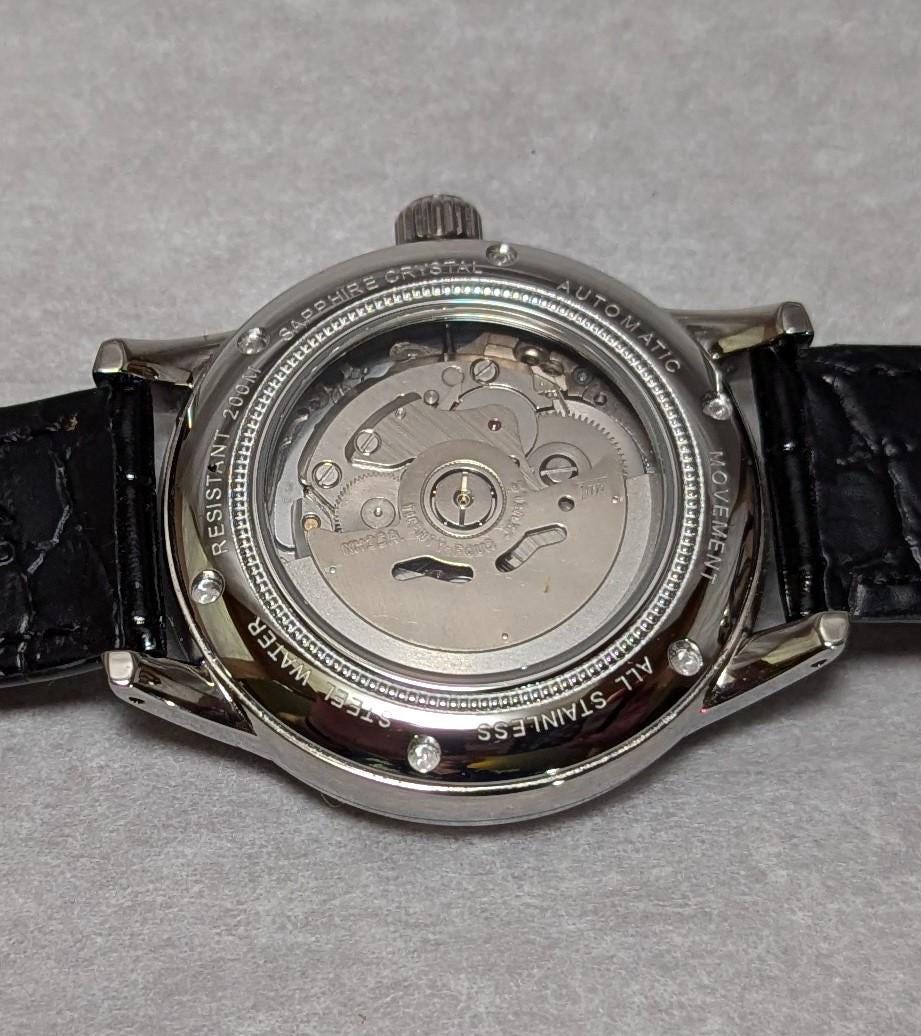 Retro Style Sphinx Model 1960 Constellation Men's Watch with a fine 24 Jewel Seiko Auto Movement Yellow Dial and Wonderful Dome Crystal