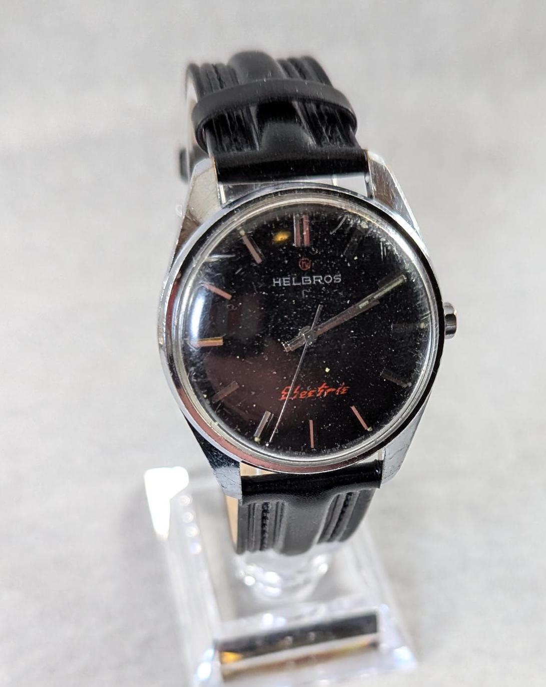 Vintage Helbros Electric Watch: Retro Black Dial, Gold Tone Bezel