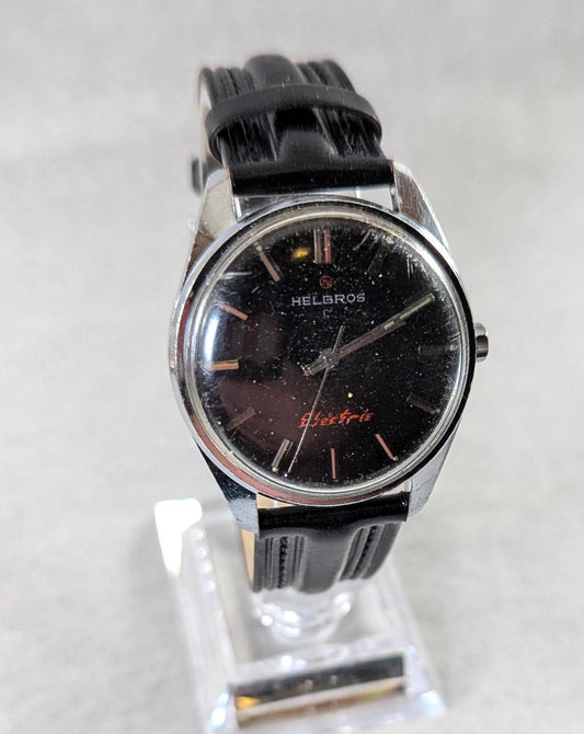 Vintage Helbros Electric Watch: Retro Black Dial, Gold Tone Bezel