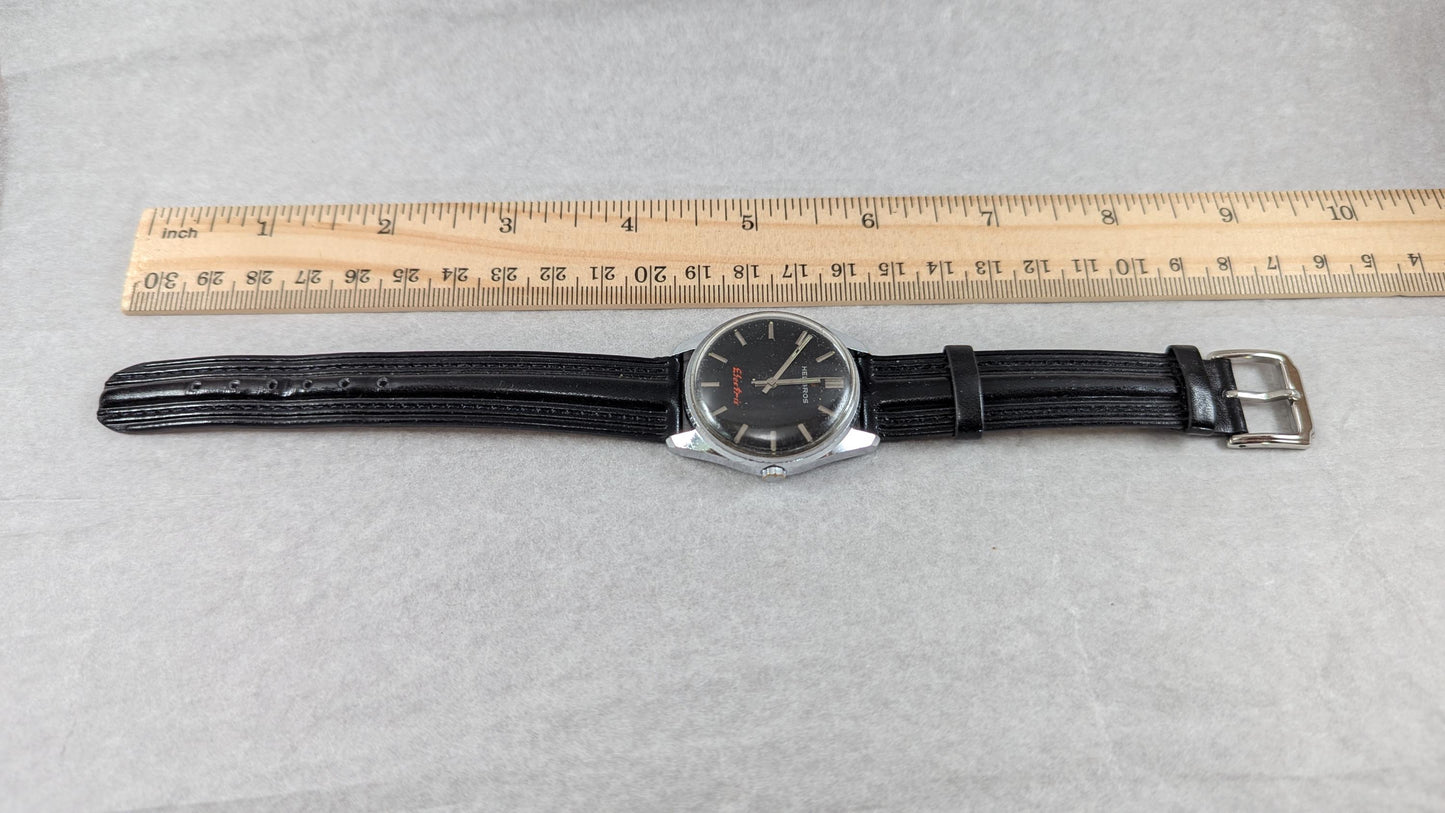 Vintage Helbros Electric Watch: Retro Black Dial, Gold Tone Bezel