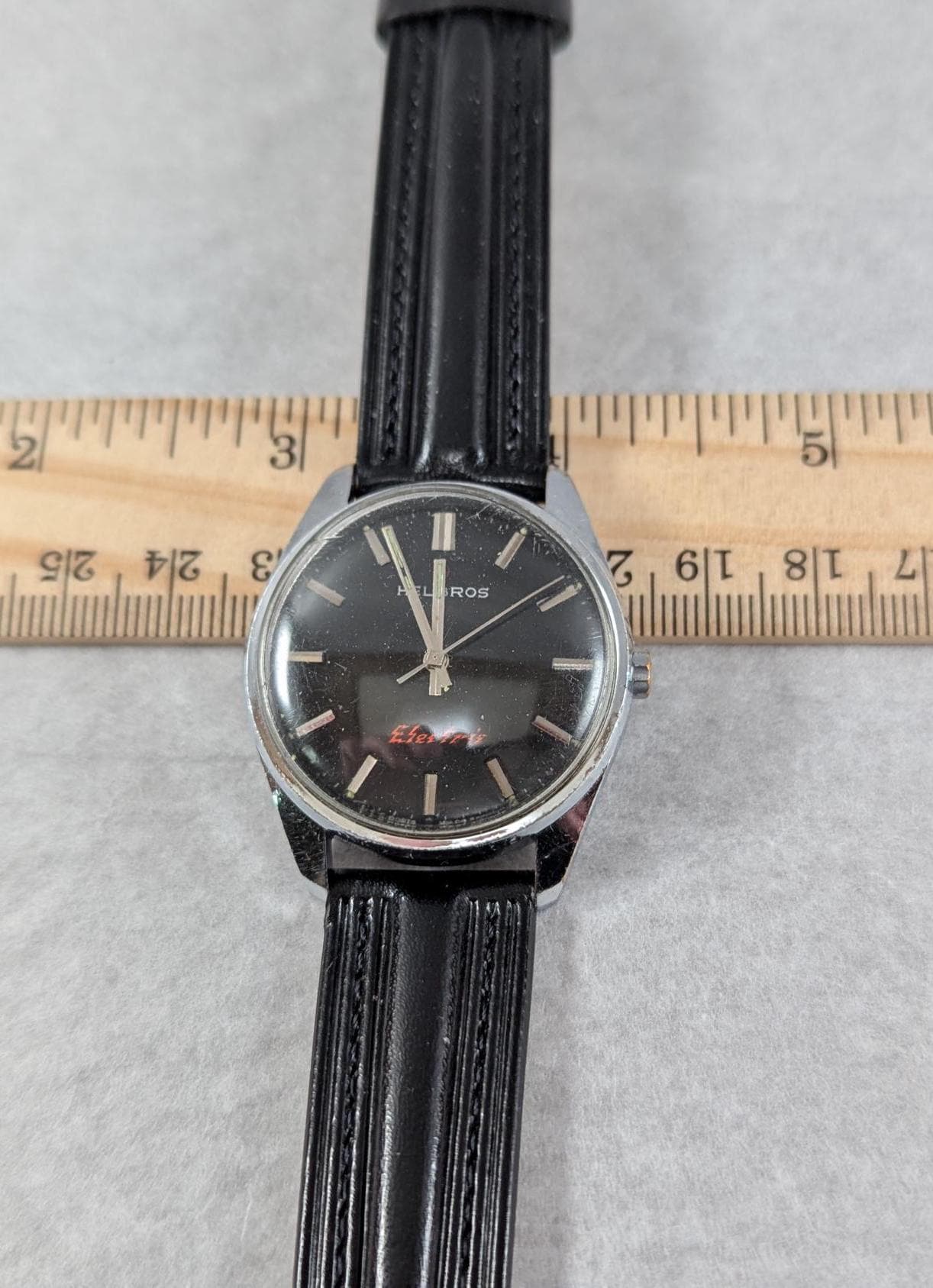 Vintage Helbros Electric Watch: Retro Black Dial, Gold Tone Bezel