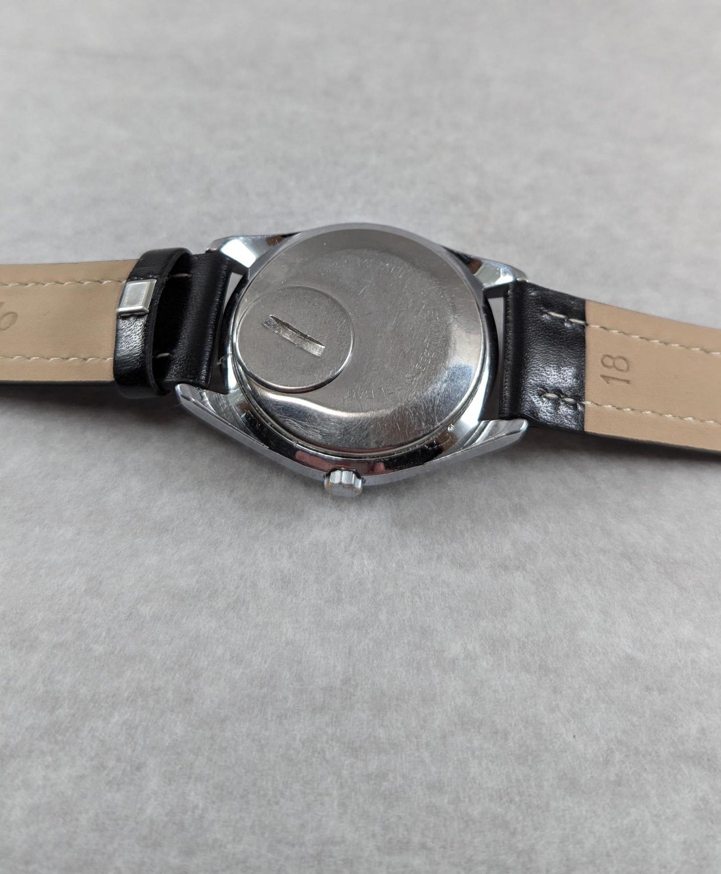 Vintage Helbros Electric Watch: Retro Black Dial, Gold Tone Bezel