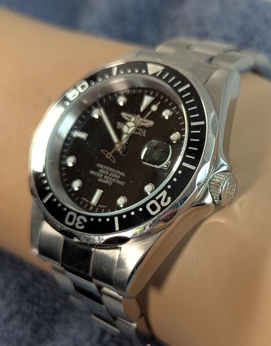 Fashionable and Stylish Invicta Pro Diver 200M Quartz Watch with New Battery - Black Dial and Nice Lume Hands  - Makes a Great Gift