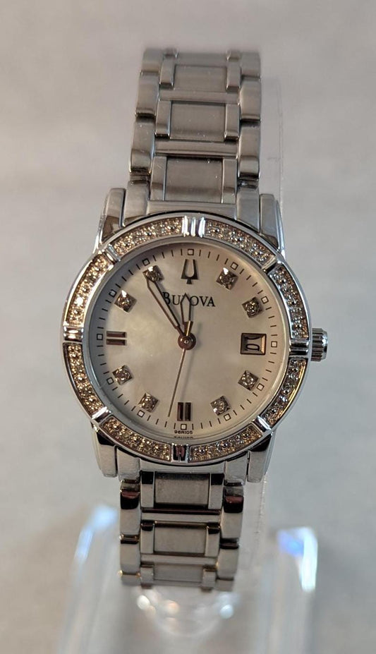 Wonderful Bulova Ladies Watch -Beautiful Mother of Pearl Dial and Fine Crystal Accents on Bezel Dial - Working with New Battery