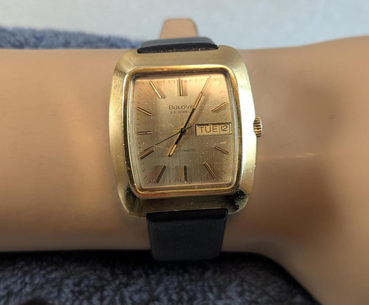 Fantastic & Rare Vintage 1974 Bulova Minute Man Automatic Wristwatch - Gold Tone Case Swiss 23 Jewel Auto Movement with new Leather Band.