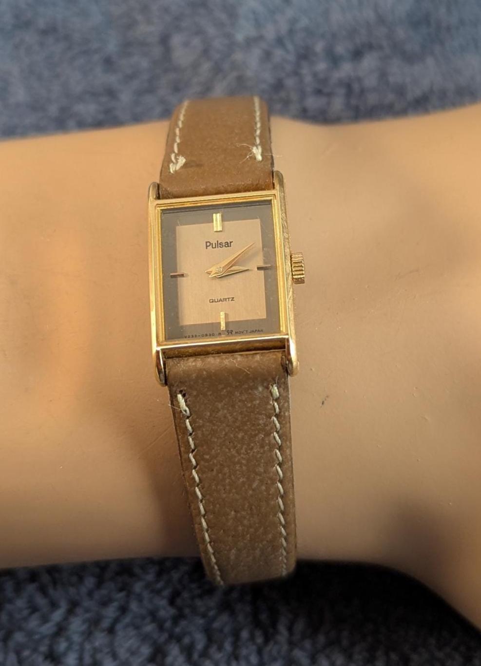 Ladies Pulsar V232-5520 Watch: Two-Tone Dial, Gold Bezel, Leather Band