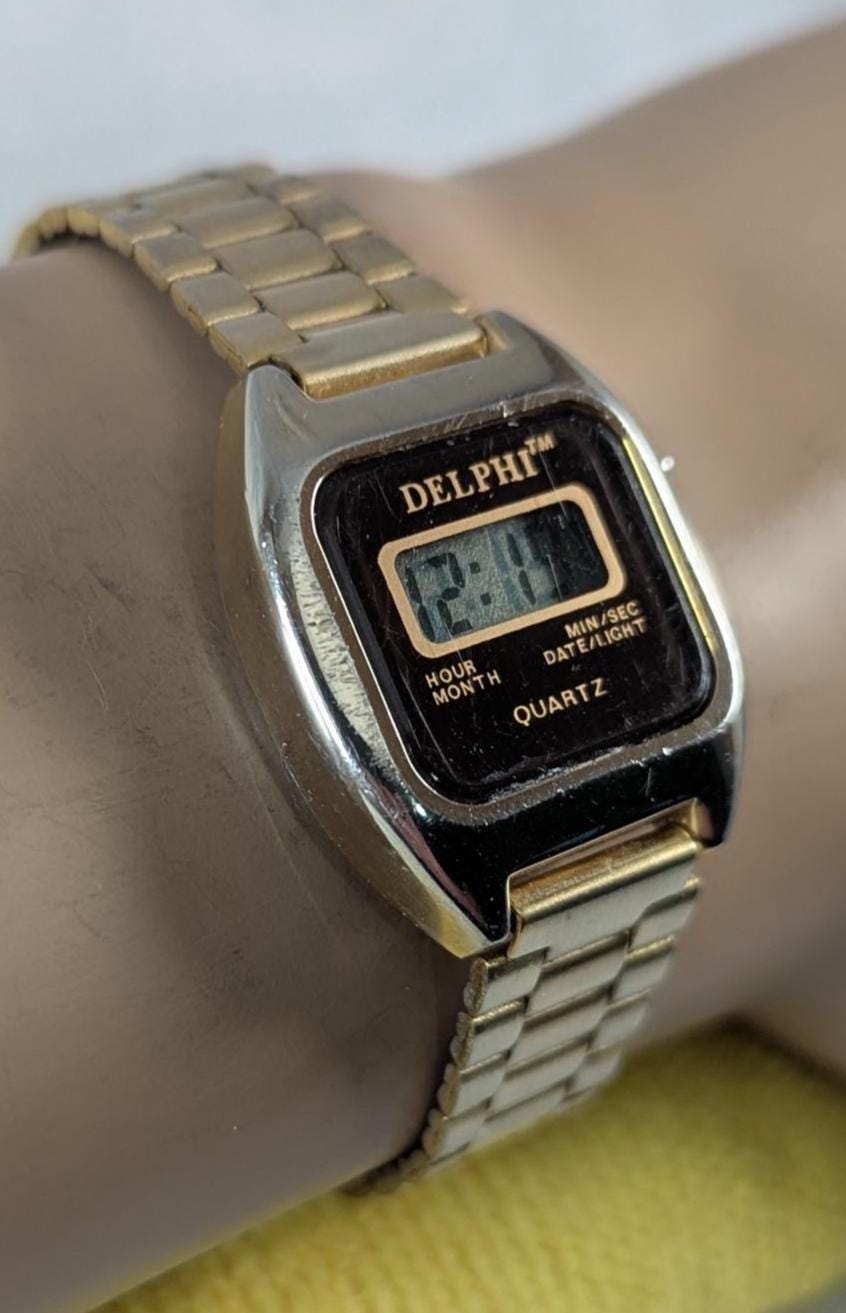 1980s Delphi Quartz LCD Digital Woman's Watch - Vintage Gold Tone
