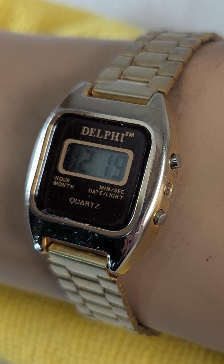 1980s Delphi Quartz LCD Digital Woman's Watch - Vintage Gold Tone